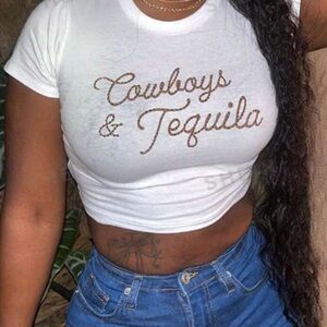 Simple white tee with the words “Cowboys and Tequila”